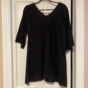 Linen tunic with hand embroidery design. From a boutique